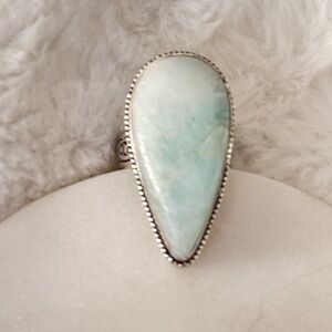 Elegant Teardrop Larimar Ring in Pale Blue